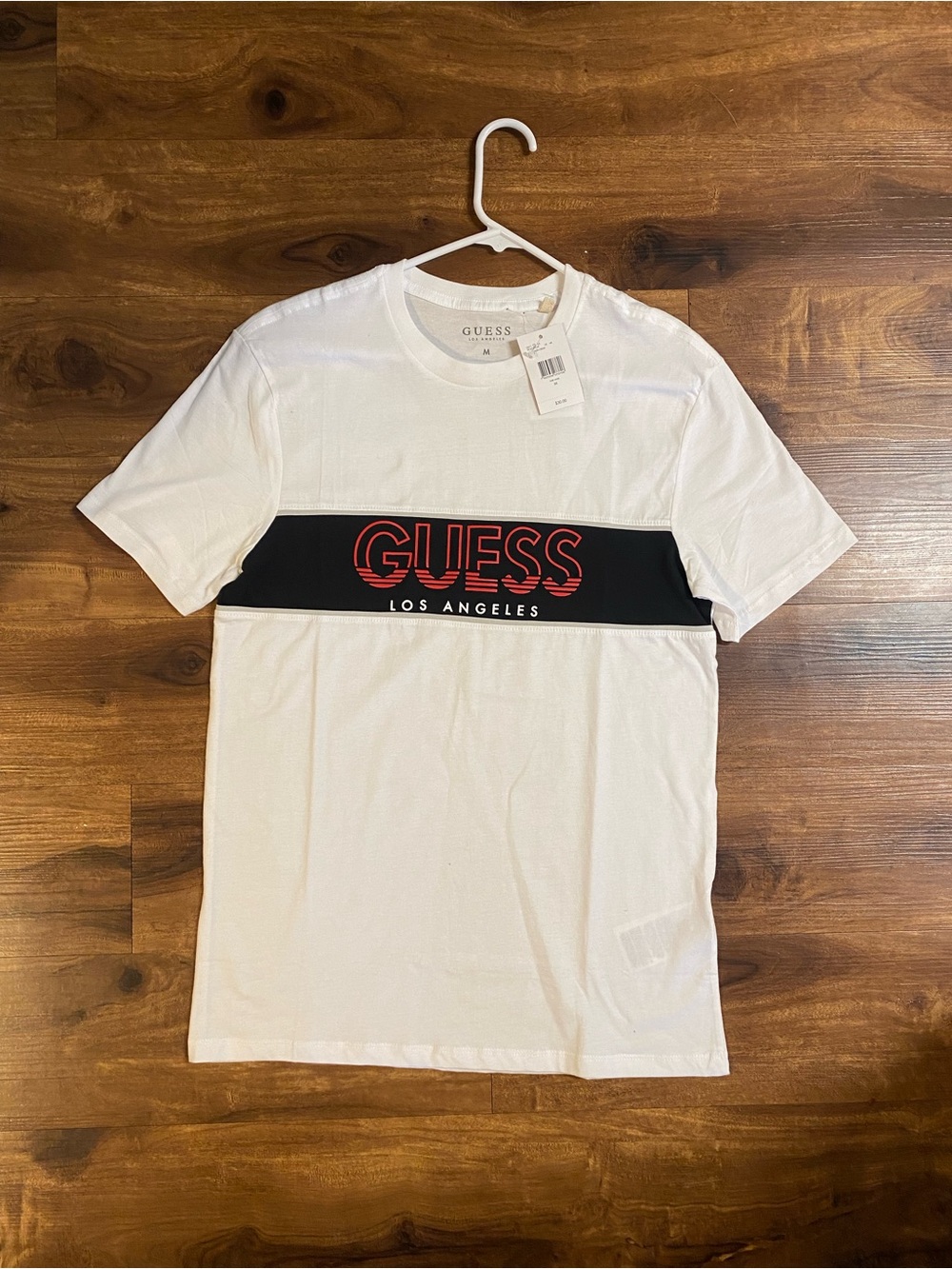 Guess White Short Sleeve Tee with Black Chest Band and Red Logo